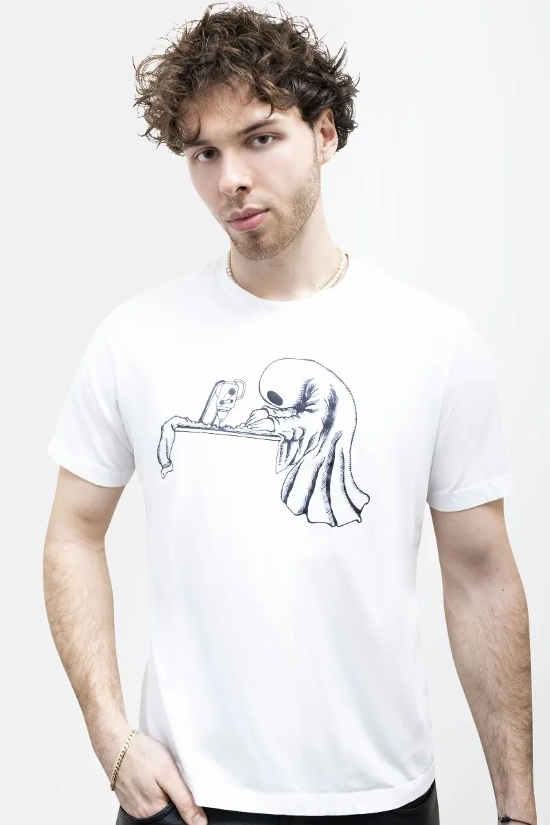 Male model wearing a white tee with a ghost designer logo.