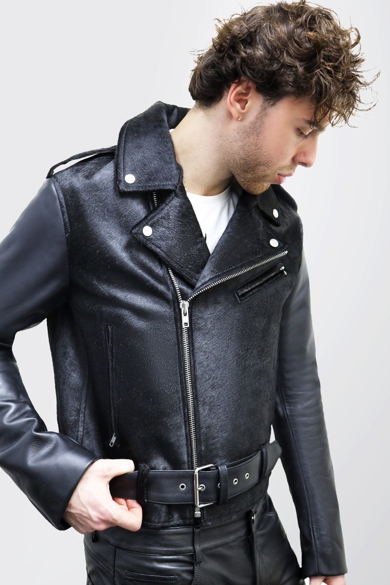 Male model wearing a Pony & Leather Moto Jacket - Premium leather with pony hair panel, trendy moto design, asymmetrical zipper